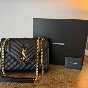 Saint Laurent Black Quilted Shoulder Bag with Gold Accents